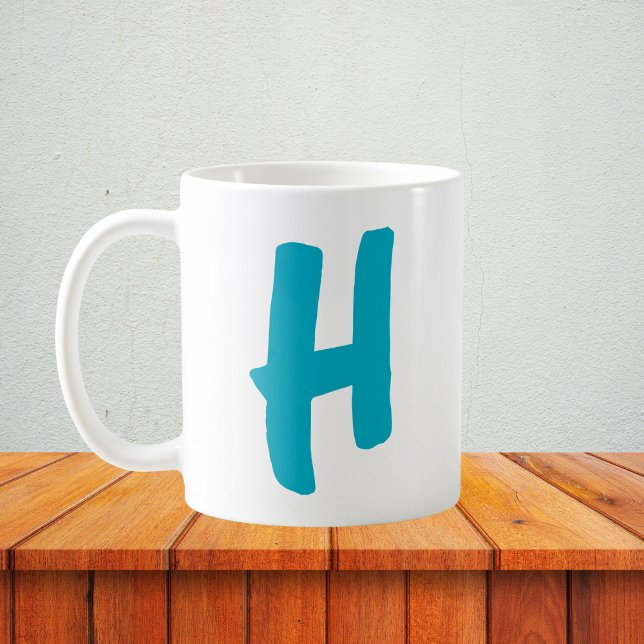 Personalisierte Initialisierung mit fett formatier Kaffeetasse (Von Creator hochgeladen)