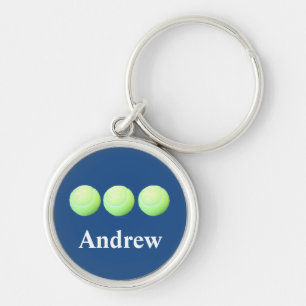 Personalisierte Tennis-Bälle in einer Reihe Schlüsselanhänger