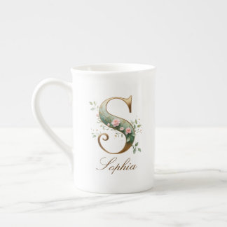Personalisierter goldener Blumenmonogramm-Initiale Prozellantasse