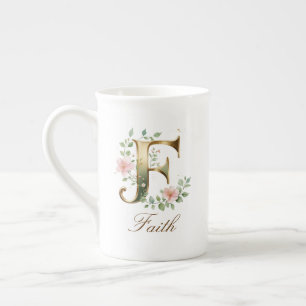 Personalisierter goldener Blumenmonogramm-Initiale Prozellantasse
