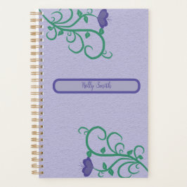 Personalisierter Planer im lila Blumendesign.