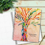 Personalisierter Rustikaler Baum Planer<br><div class="desc">Dieser einzigartige Planner ist mit einem Regenbogenbäumchen auf beigem Hintergrund dekoriert. Das originelle Design wurde aus Mosaik mit winzigen Glasstücken in lebhaften Farben hergestellt. Passen Sie es mit Ihrem Namen und Jahr an. Verwenden Sie die Option Entwurfswerkzeug, um die Textgröße, den Stil oder die Farbe zu ändern. Weil wir unsere...</div>
