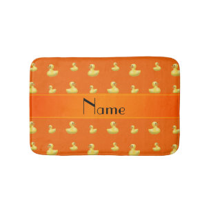 Personalisiertes orange Gummientennamensmuster Badematte