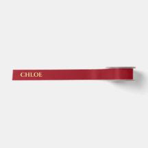 Personalisiertes rotes Band mit goldenem Namenszug