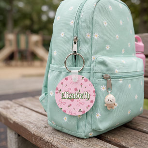 Personalisiertes Schuletikett Mädchen mit floralem Schlüsselanhänger