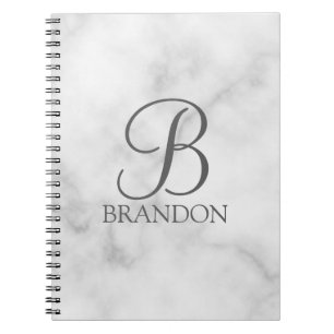 Personalisiertes Skriptmonogramm und Name aus weiß Notizblock
