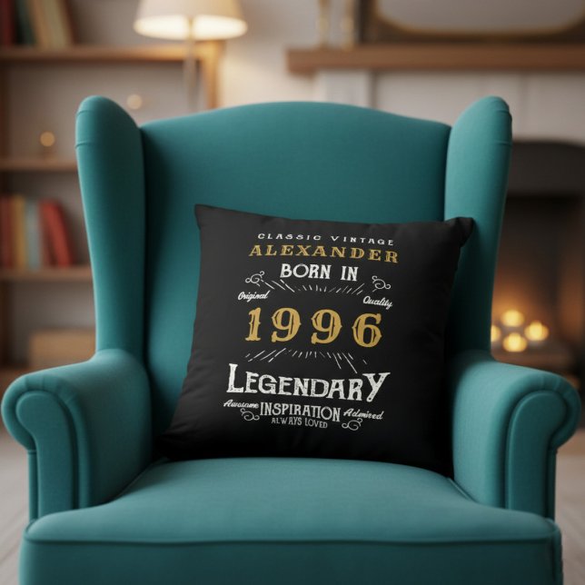 Personalized 30th Birthday Born 1996 Legend Black Kissen (Born 1996 throw pillow on a green chair.)