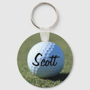 (Personifizieren Sie), Golf-Ball auf grünem Schlüsselanhänger