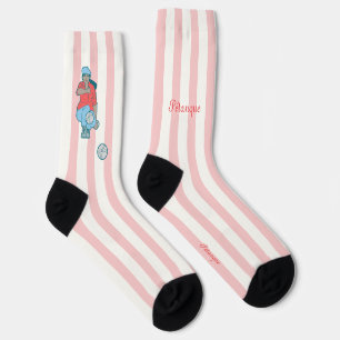 Pétanque, weibliche Boulespielerin in Rot Socken