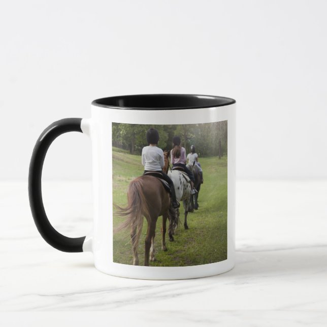 Pferde der kleinen Mädchen Reit Tasse (Links)