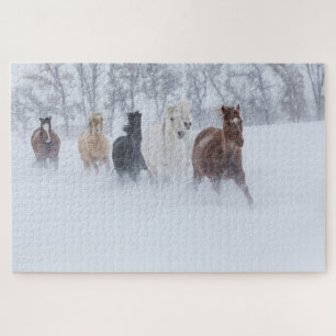 Pferde laufen durch den Schnee Puzzle