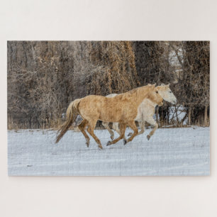 Pferde laufen im Schnee Puzzle