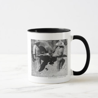 Pferde mit dem Pitchfork Brand brandmarken Tasse