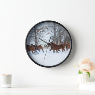 Pferdeherde im Schnee Uhr