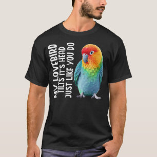 Pfirsichgesichtiger Unzertrennlicher neigt Kopf Sc T-Shirt