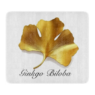 Pflanzliches Leben: Gold Ginkgo Biloba Blatt anpas Schneidebrett
