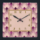 Pflaumenfarbene Art Deco Square Uhr<br><div class="desc">Ich habe diese Art Deko Vorlage genommen und sie für ein paar Artikel in meinem Zazzle-Shop verwendet. Ich habe es hier auf einem 10-Zoll-Quadratzuhr benutzt. Die Farbe ist Pflaume auf einer neutralen Farbe und etwas Gold. Ich denke,  das macht eine schöne Art Deko Uhr für Ihre Zuhause.</div>