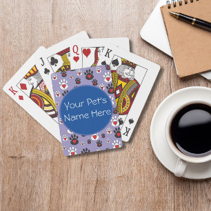 Pfotenabdrücke mit roten Herzen auf blauem persona Spielkarten