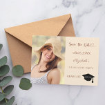 Photo champagne mocha Graduation Save The Date<br><div class="desc">A photo Save the date card for a graduation. On front: Add your own vertical size photo of the graduate. A modern champagne colored background, mocha colored text. Templates for a name and date. The name and the text: Save the Date are written with a modern hand lettered style script....</div>