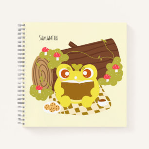 Picnic Frog liest ein Buch