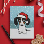 Piebald Dachshund Santa Cute Wiener Dog Christmas Feiertagskarte<br><div class="desc">This adorable Christmas card is perfect for piebald dachshund lovers! The hand-drawn image of the festive and lovable wiener dog wearing a Santa hat captures the playful spirit of the holidays. Customize the inside with your own thoughtful sentiments to help spread joy to everyone on your list this season. Great...</div>