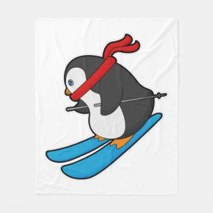 Pinguin als Skifahrer mit Ski Fleecedecke