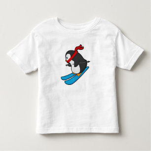 Pinguin als Skifahrer mit Ski Kleinkind T-shirt