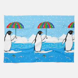 Pinguin im Schnee auf Geschirrtuch