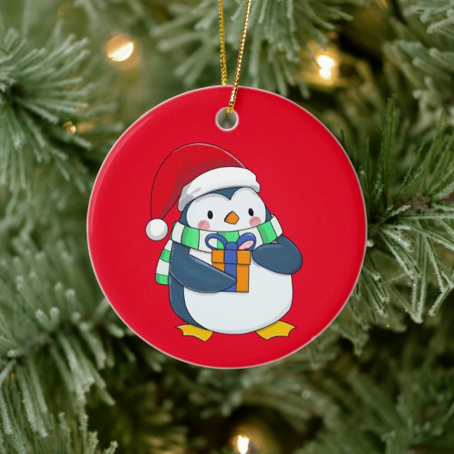 Pinguin in einem Weihnachtshut mit Geschenk Keramik Ornament (Baum)