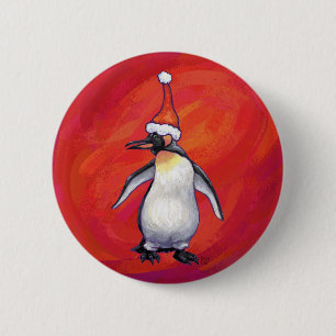 Pinguin in Weihnachtsmannmütze auf Rot Button