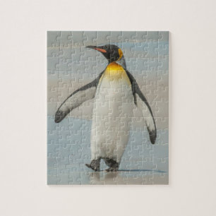 Pinguin läuft am Strand entlang Puzzle