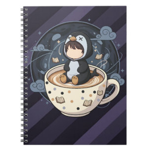 Pinguin mit warmer Tasse lesend Notizblock