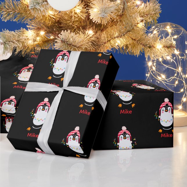 Pinguin mit Weihnachtsbeleuchtung Geschenkpapier (Feiertage)