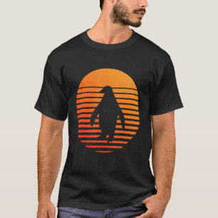 Pinguin-Schattenschatten-Silhouette vor einer Sonn T-Shirt