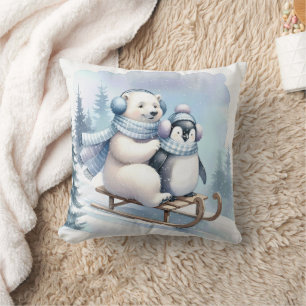 Pinguin und Eisbär auf einem Schlitten Kissen