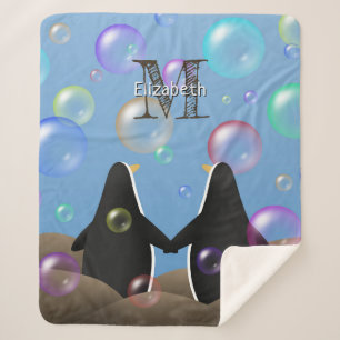 Pinguine halten Flossen und beobachten Blasen Sherpadecke