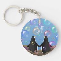 Pinguinfreunde schauen auf mit Monogramm Blasen