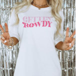 Pink Cowgirl Gettin Rowdy Junggeselinnen-Abschied T-Shirt<br><div class="desc">Dieses Design enthält eine Retro-Funky-Formulierung,  die lautet: Gettin' Rowdy. Ideal,  um die letzte Diskothek der Braut oder das letzte Rodeo zu feiern! Sehen Sie sich die gesamte Kollektion an,  um mehr passende Artikel zu finden!</div>