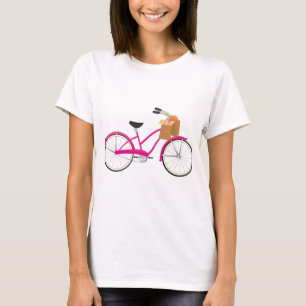Pink-Fahrrad mit Orangen T-Shirt