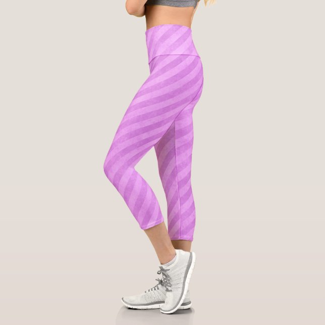 Pink-Streifen mit elektrischer Energie Capri Leggings (Links)