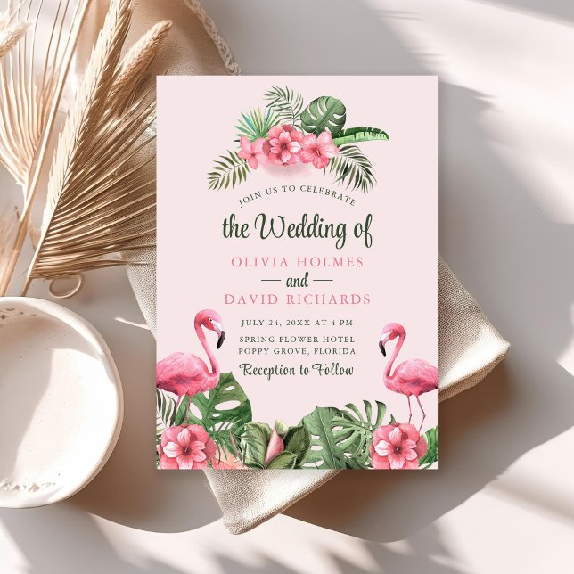 Pink Watercolor Tropical Flamingo Wedding Einladung (Pink Watercolor Tropical Flamingo Wedding Invitation on sunny table with dry palm leaf.)