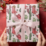Pink Western Howdy Christmas Cowgirl Geschenkpapier<br><div class="desc">Dieses lustige und festliche Western Howdy Weihnachts-Cowgirl Packpapier zeigt handgezeichnet Illustrationen von Xmas Cowgirl Stiefel, Hüte, Fingern, Kakteen, heiligen Beeren und Sternen. Alles vor einem eleganten, sehr weichen rosa Hintergrund.</div>