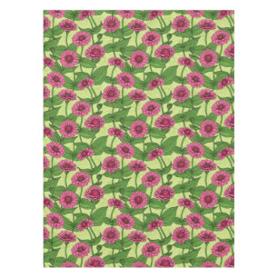 Pink Zinnias auf hellgrün Tischdecke