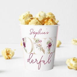 Pinkfarbene Pfingsteine auf eine bunte Geburtstags Pappbecher