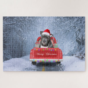 Pit Bull Dog in Snow sitzend im Weihnachtswagen Puzzle