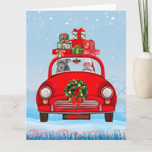 Pitbull Hund in Auto mit dem Weihnachtsmann Karte