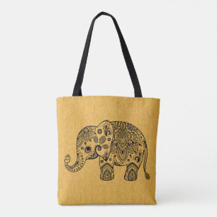 Plack Paisley Elephant auf Gold Textur