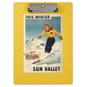 Plakat einer rothaarigen Frau, die lächelt und Ski Klemmbrett