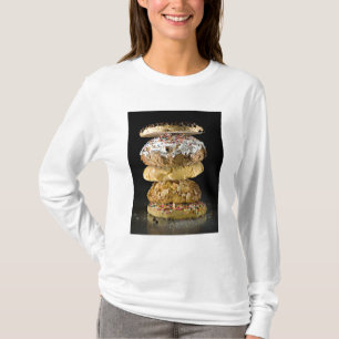 Plätzchen in einem Stapel T-Shirt