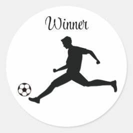 Playing soccer graphic black runder aufkleber
